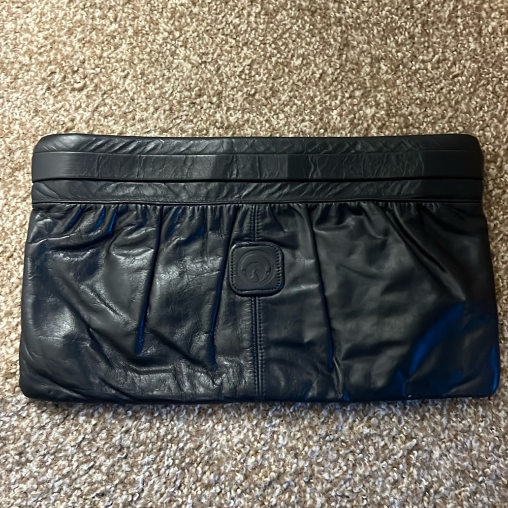 Blue leather clutch